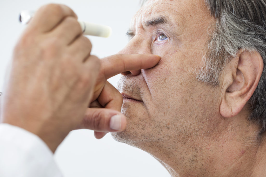 Older Man getting eyes checked