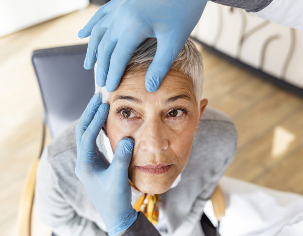 Senior patient having an eye exam at ophthalmologist's office