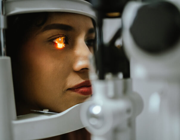 Woman with astigmatism getting eye exam